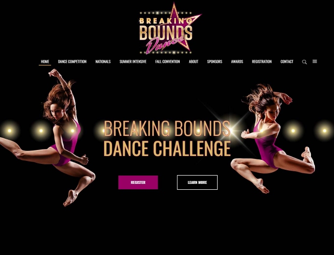 Two dancers leap high on the website home page